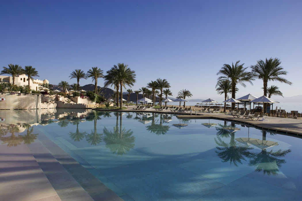 The swimming pool of Mosaique Hotel overlooks the Red Sea